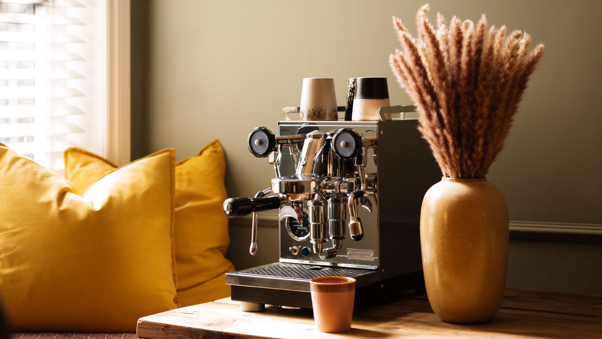 Coffee machine next to window seat